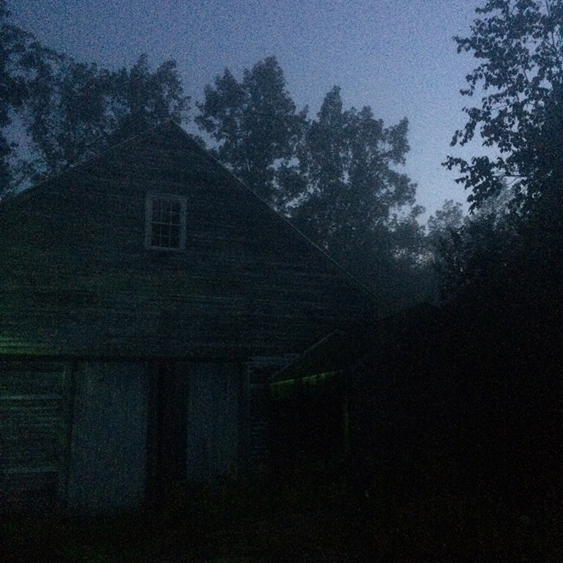 Barn on a misty evening - copyright John Bennett